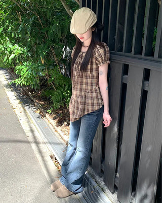 Low-waist point-washed flare jeans