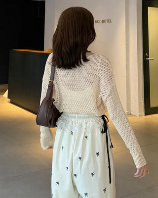 Loose-fitting perforated knit