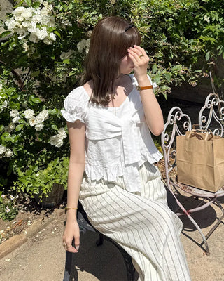 Bust strap ribbon puff frill blouse
