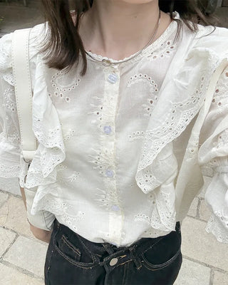 Punched ruffle blouse