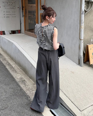 High-waisted, two-pleat, button-down wide-leg trousers