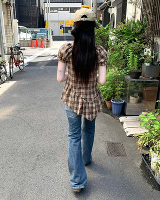 Low-waist point-washed flare jeans