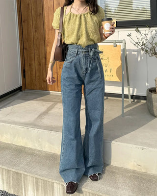 Strap high-waisted denim pants