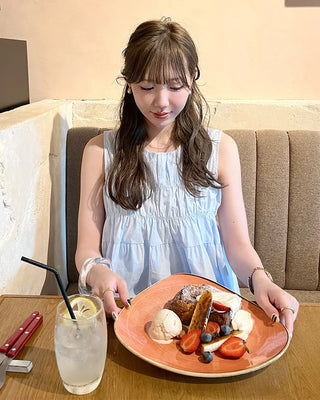 Shirred sleeveless blouse