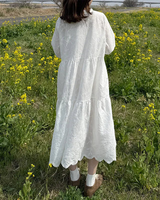 Long dress with neck lace detail and ruffles