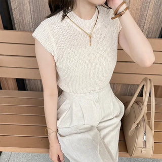 Sleeveless mock neck knit