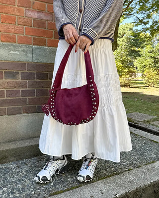 Studded suede shoulder bag