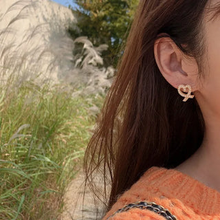 Heart design gold earrings