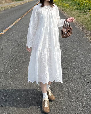 Long dress with neck lace detail and ruffles