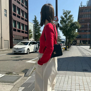 Round punching cardigan