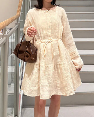 Shirred dress with strings