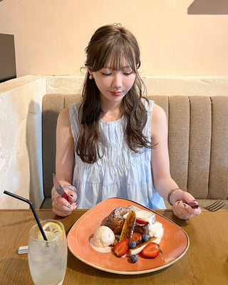 Shirred sleeveless blouse
