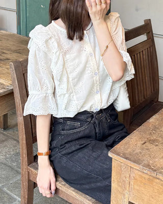 Punched ruffle blouse