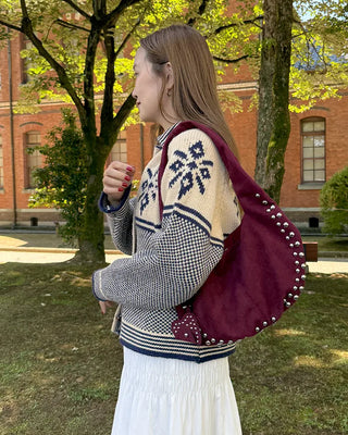 Studded suede shoulder bag