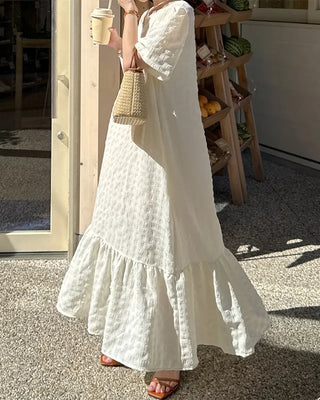 Long dress with ruffled hem