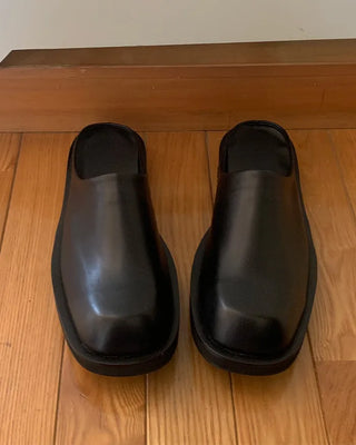 Simple black clogs