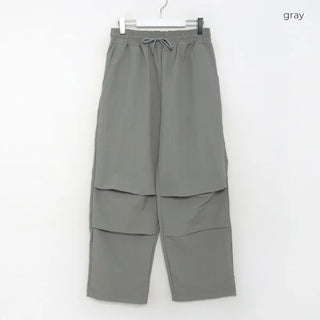 Two-pleat detail string pants
