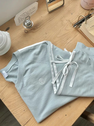 Loose-fitting stitched ribbon V-neck sweatshirt (4c)