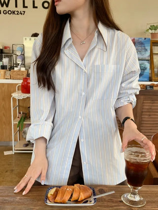 Loose-fit cotton striped shirt (2c)