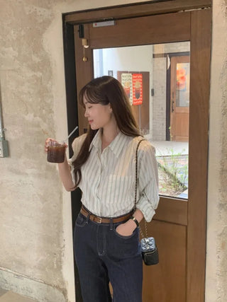 Loose-fit cotton striped shirt (2c)