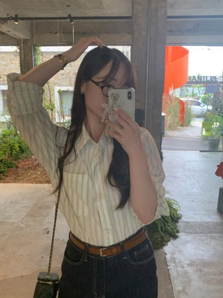 Loose-fit cotton striped shirt (2c)