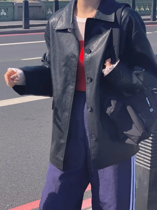 Loose-fitting black half-leather jacket