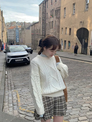 Loose-fit wool twist cable knit sweater