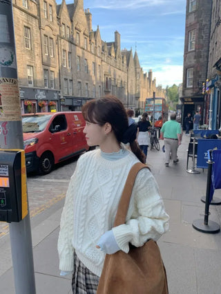 Loose-fit wool twist cable knit sweater