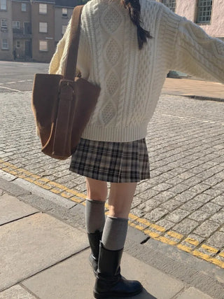 Loose-fit wool twist cable knit sweater