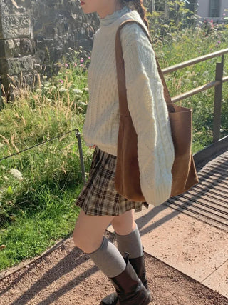 Loose-fit wool twist cable knit sweater