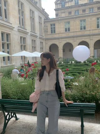 Autumn blouse with frills and pleats