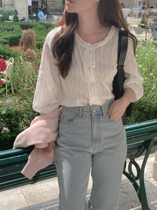 Autumn blouse with frills and pleats