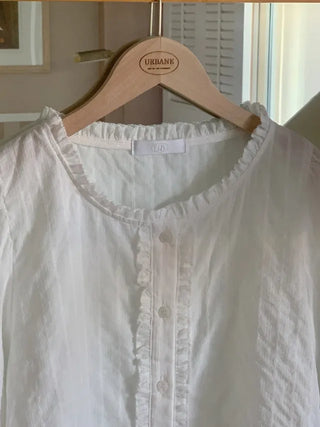 Autumn blouse with frills and pleats