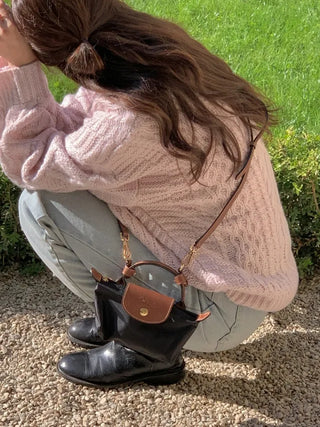 Loose-fit wool twist cable knit sweater