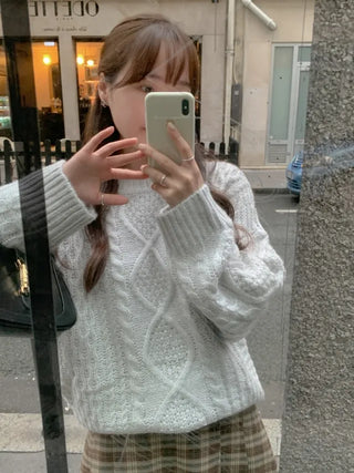 Loose-fit wool twist cable knit sweater