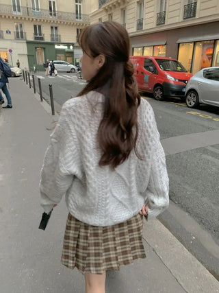Loose-fit wool twist cable knit sweater