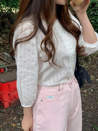 Autumn blouse with frills and pleats