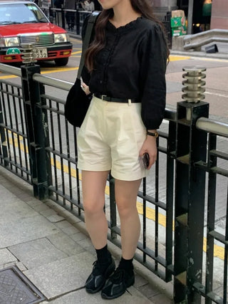 Autumn blouse with frills and pleats