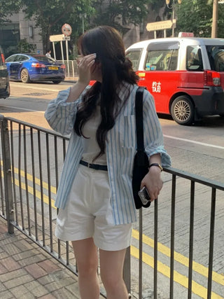 Loose-fit cotton striped shirt (2c)