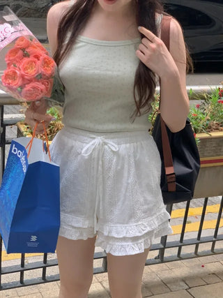 Eyelet punched sleeveless top