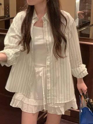 Loose-fit cotton striped shirt (2c)
