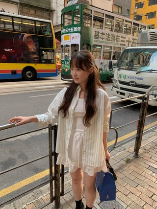 Loose-fit cotton striped shirt (2c)