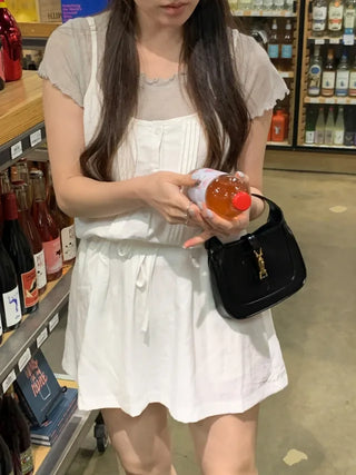 Ribbon-tucked camisole dress