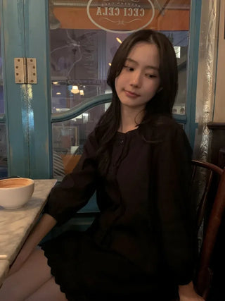 Autumn blouse with frills and pleats