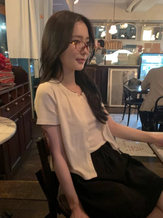 [set] Eyelet punching sleeveless short-sleeved cardigan set
