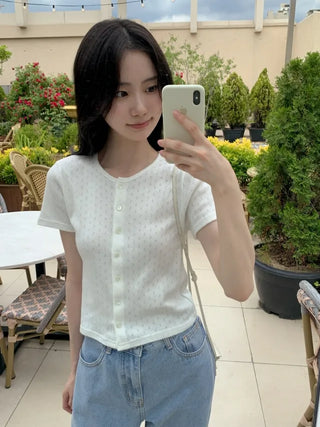 Eyelet punched sleeveless top