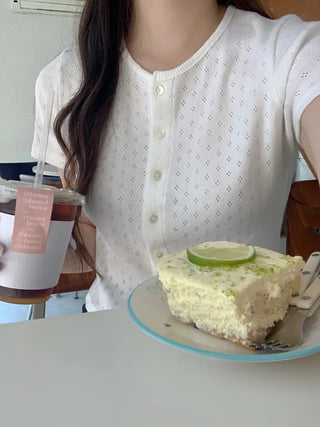 Eyelet punched sleeveless top