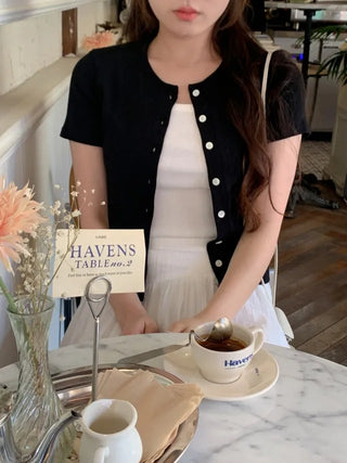 Eyelet punched sleeveless top