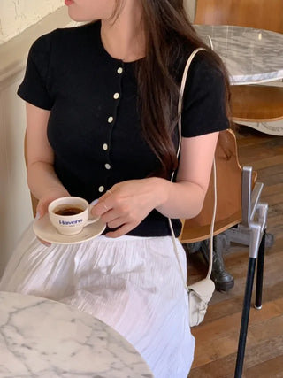 Eyelet punched sleeveless top