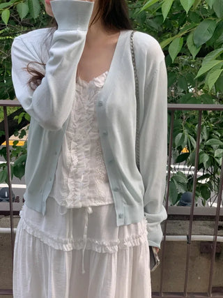 Frilled punched sleeveless layered blouse